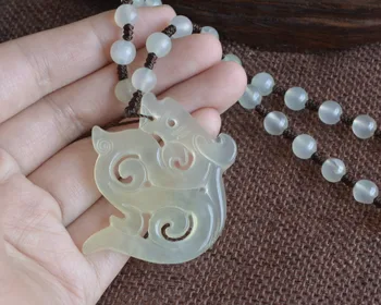 

Genuine natural jade jade flower and bone with natural Liaoning jade gogok pendant Pendant with Talasite