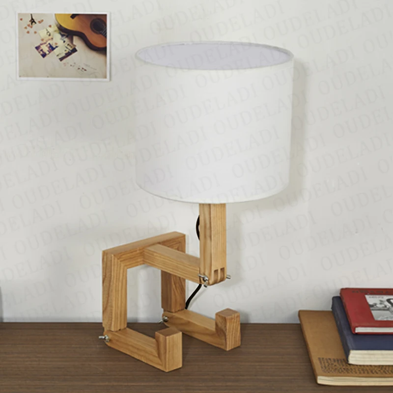 Preise Roboter Form Holz Tisch Lampe E14 Lampe Halter 110 240V Moderne Tuch Kunst Holz Schreibtisch Tisch Lampe Parlor indoor Studie Nacht Licht