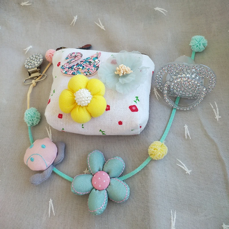 

Lovely flowers shining bling crystal rhinestone Baby Pacifier/ Nipples /Dummy /cocka /chupeta &pacifier clips and bag