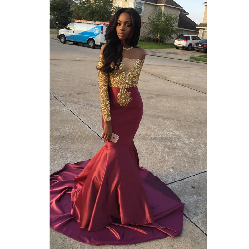 red and gold gown with sleeves
