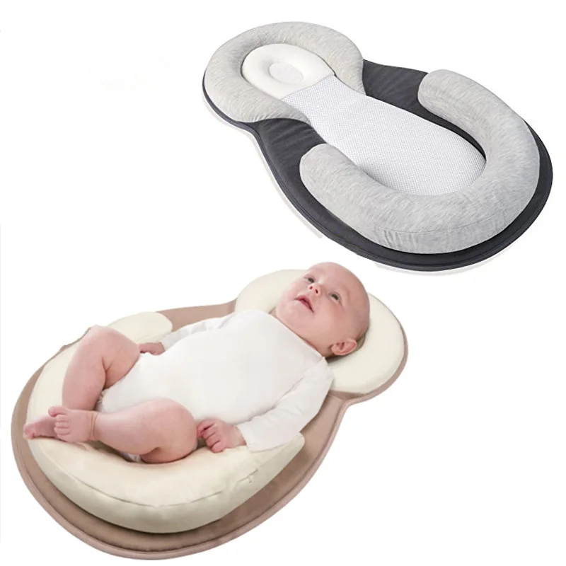 Neonatal pillow infant sleep positioning pad to prevent deviant head