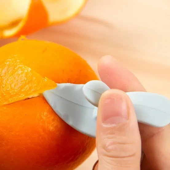 

5pcs/lot Creative Kitchen Tools Peeler Orange Peeler Machine Lemon Zesters Finger Type Cleverly Open Orange Peel Device KX 320