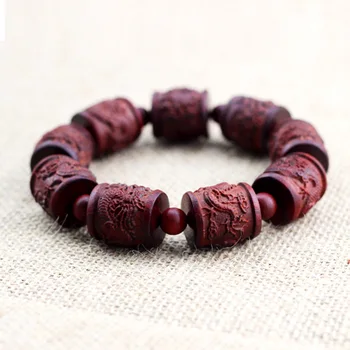 

Factory wholesale supply of Zambia blood Tan Shuanglongxizhu hand String Bracelet beads carved wooden crafts