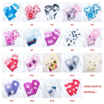 

More 19Patterns Mini Cute Jewelry Plastic Handle Bags Lots 100pcs 9x15cm Small Present Packaging Bags Plastic Candy Bags