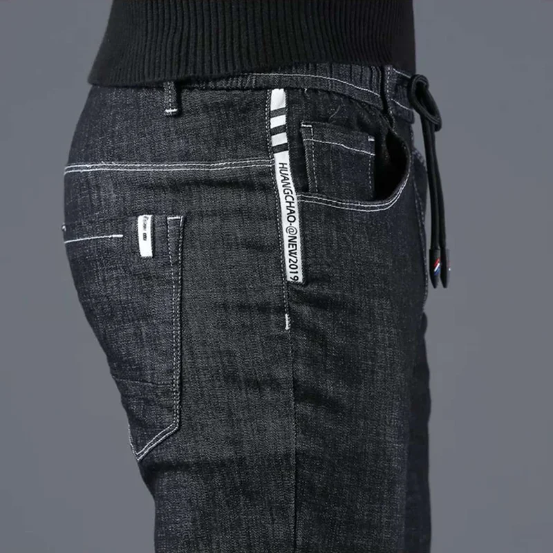

Spring men's jeans 2019 new Korean version of the trend to trim body elastic casual black pants men's fall suit