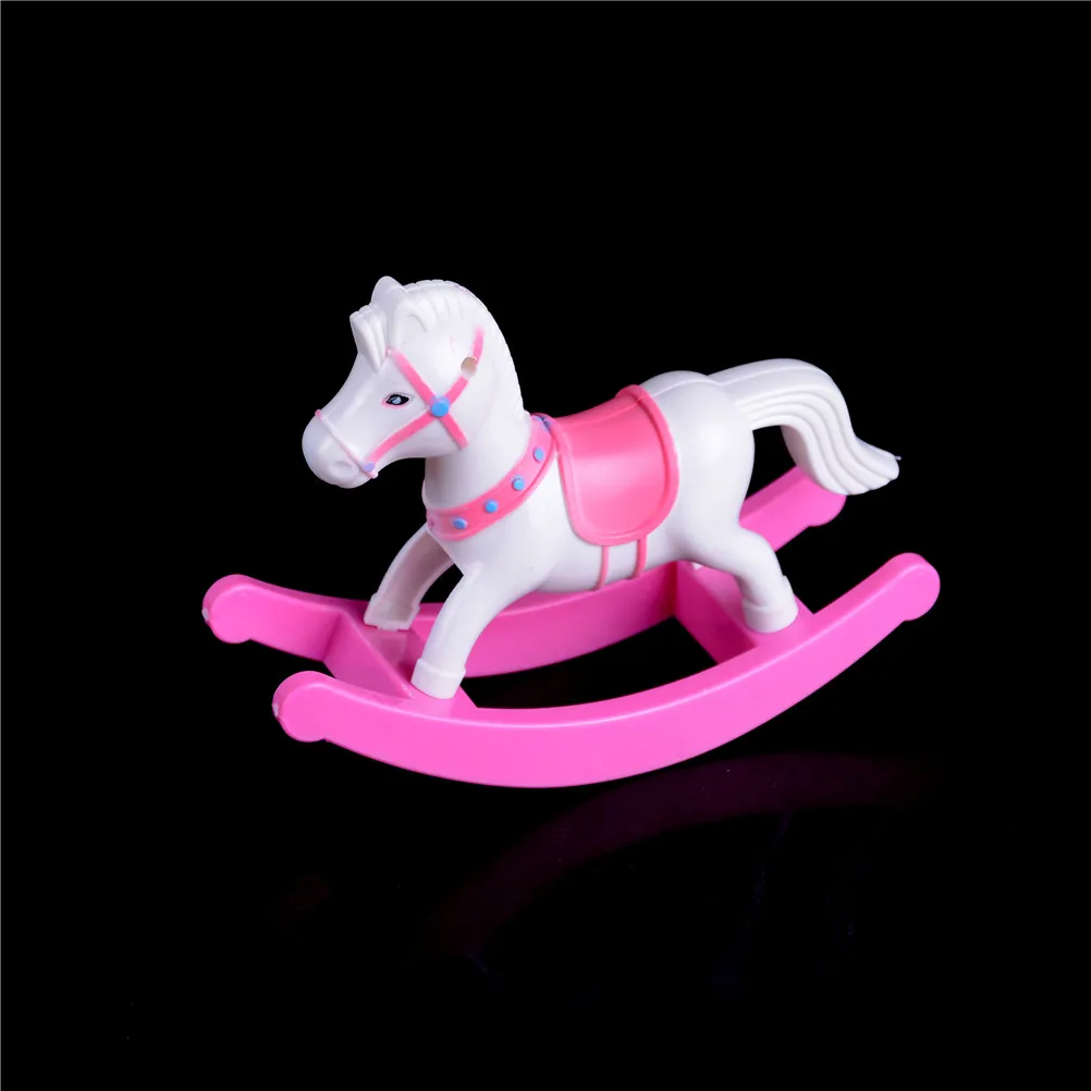 pink plastic rocking horse