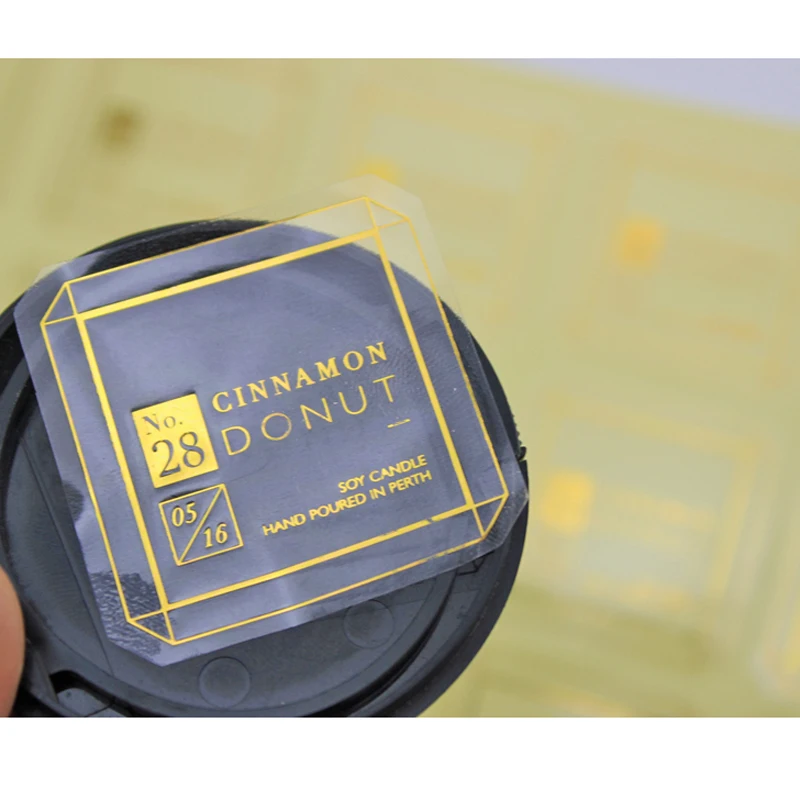 

Newly design transparent vinyl gold foil sticker label, transparent logo sticker printing with hot stamping surface finish