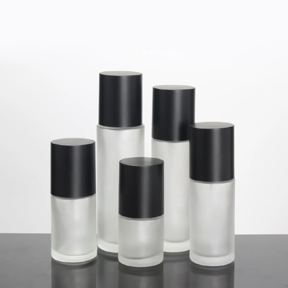 

100pcs/lot 40ml glass bottle serum with pump, pump spray bottle with matte black lid
