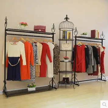 

The iron art clothing store shows a rack of heart-shaped clothing on the side of the shelf