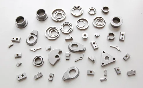 Production of stainless steel structural parts by iron-based powder metallurgy 017