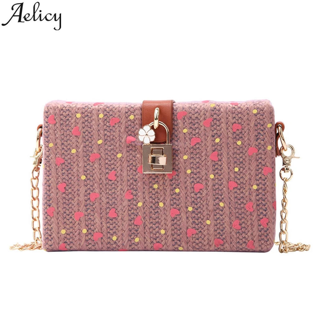 

Aelicy New heart-shaped Sequins Flower Lock Buckle Straw Bags Female Summer Rattan Bag hand-woven Beach Bohemian Crossbody Bag