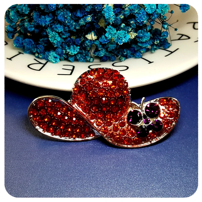 

New Arrival Rhinestone Red Hat Brooch Pin with a Purple Butterfly