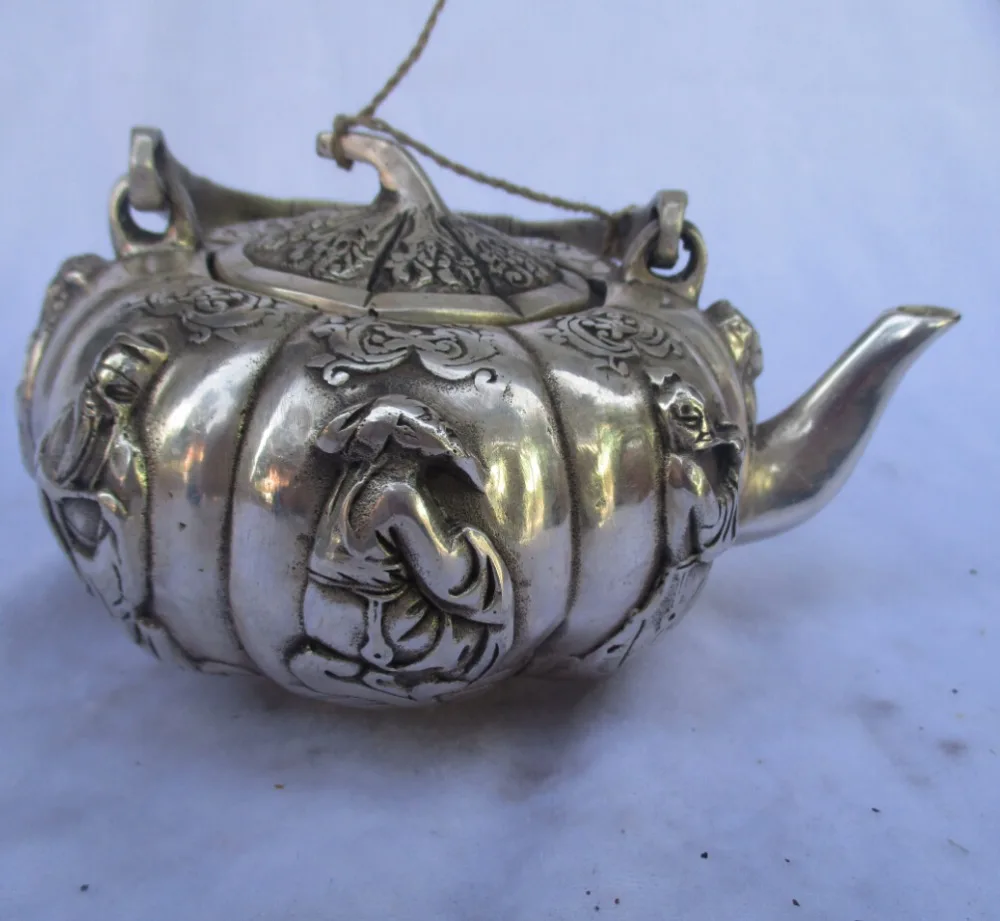 

Collectible Decorated Old Handwork Tibet Silver Carved Pumpkin style 8Immortals Handle Teapot/Flagon Free shipping 000012