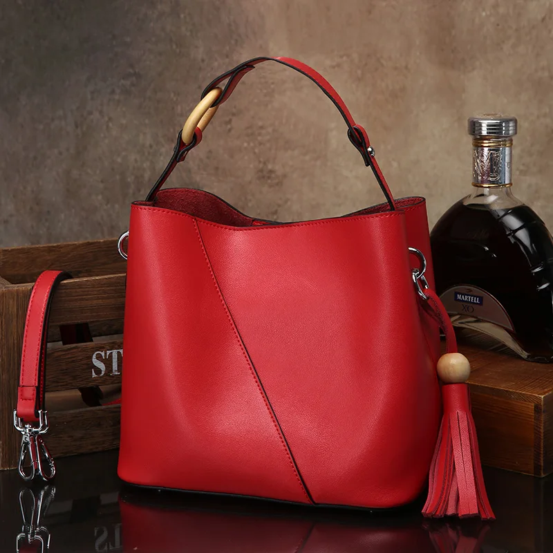 

LUODUN 2018 fashion new cowhide handbags bucket bag wild European and American wind handbags simple fringed shoulder bag ladies