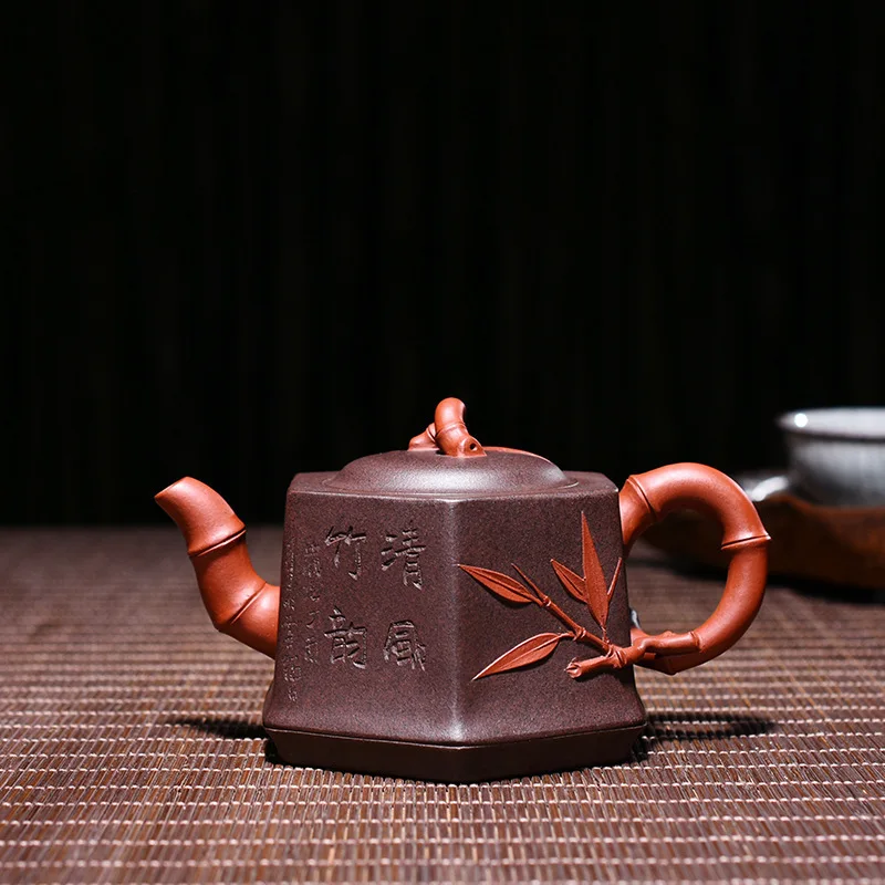 

Quality Goods Famous Manual Raw Ore Two Colors Of Purple Clay Bamboo Joint Six Square Kettle Kungfu Online Teapot Tea Set Suit