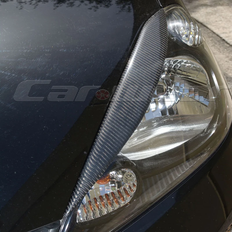 

Carbon Fiber Front Headlight Cover Eyelid Eyebrow For Hon da Jazz Fit 2009-2013