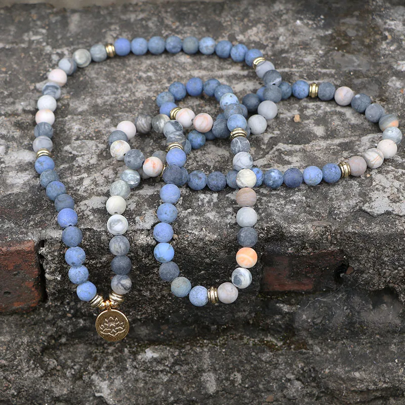 Comprar EDOTHALIA 108 cuentas Mala Lotus pulsera 8MM mate piedra azul y piedra Picasso mujeres hombres meditación pulseras de yoga Drop ship
