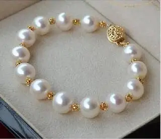 

Free Shipping >> CHARMING 10-11 MM ROUND SOUTH SEA GENUINE PEARL BRACELET 14KT