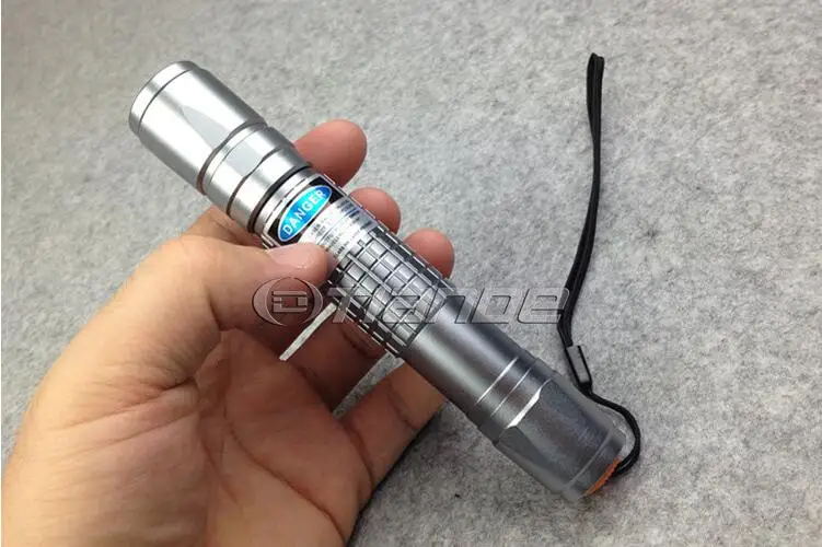 

Most Powerful 450nm 100000m Blue Light Laser Pointer Strong Beam Focus Cigarette Lighter Flashlight Burn Dry Wood lazer Hunting