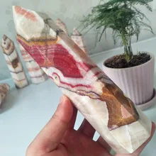 A Oversized stone wand point natural rhododendron crystal decorated obelisk and hexagonal crystal point healing crystals
