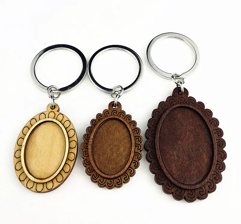 

8pcs Ellipse cabochon dark brown wood keychain base settings blank wooden trays for keyring Keychain making