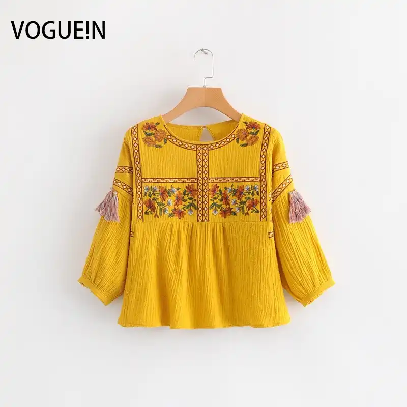 yellow embroidered blouse