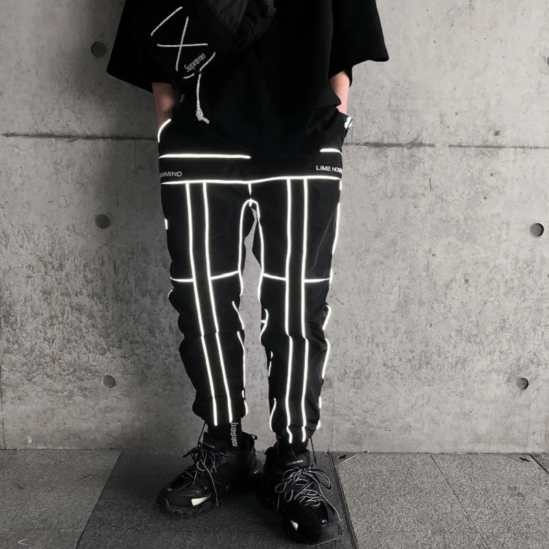 Cena Hip Hop spodnie odblaskowe mężczyźni biegaczy spodnie dresowe męskie streetwear noc błyszczące światła migać długie spodnie dla par