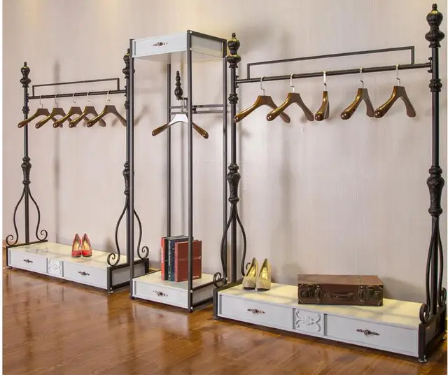 Vintage high end iron clothing racks. Clothing store shelves. Display