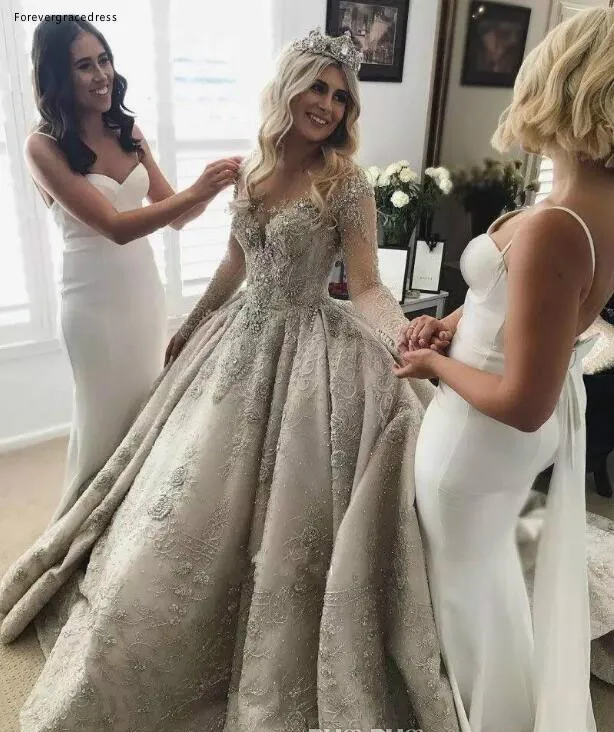 Luxury Arabic Silver Long Sleeves Wedding Dresses 2019 New Elegant Sheer Neck Illusion Back Lace Beaded Crystals Bridal Gowns BC0533  488 (1)