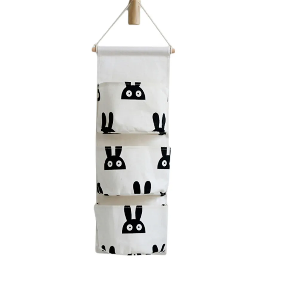 

Ellenmar Wall Storage Organizer Cartoon Rabbit Printing Linen/Cotton Hanging Storage Bag with 3 Pockets Multi-Use Home Organizer