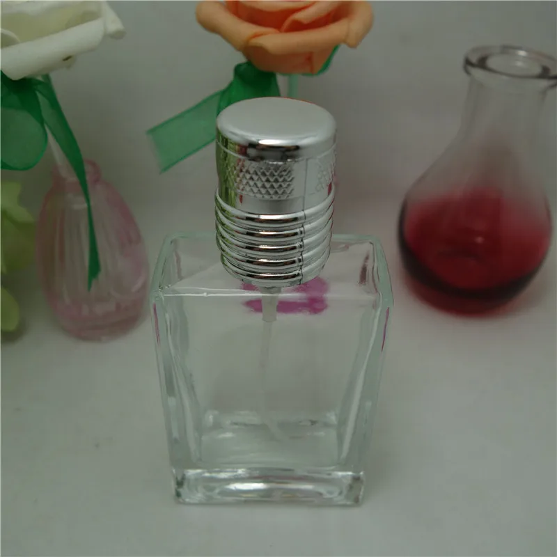 

DHL Free 50pcs 30ML Fashion Portable trranparent Glass Refillable Perfume Bottle With Aluminum Atomizer Empty Cosmetic Container