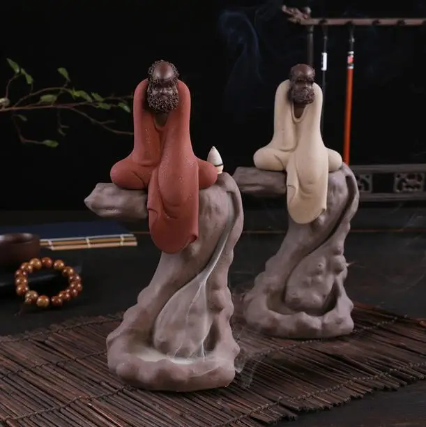 

Alpine flowing water Dharma censer Zisha Guan Yan Ceramic Decoration tower sandalwood incense furnace