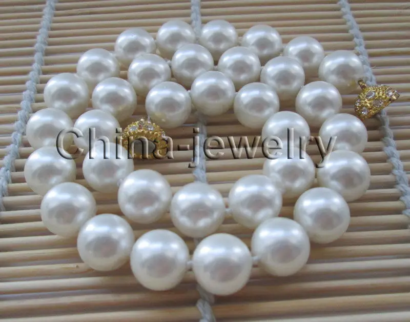 

Free shipping >>>>>Beautiful 18" 12mm white round south sea shell pearl necklace - magnet