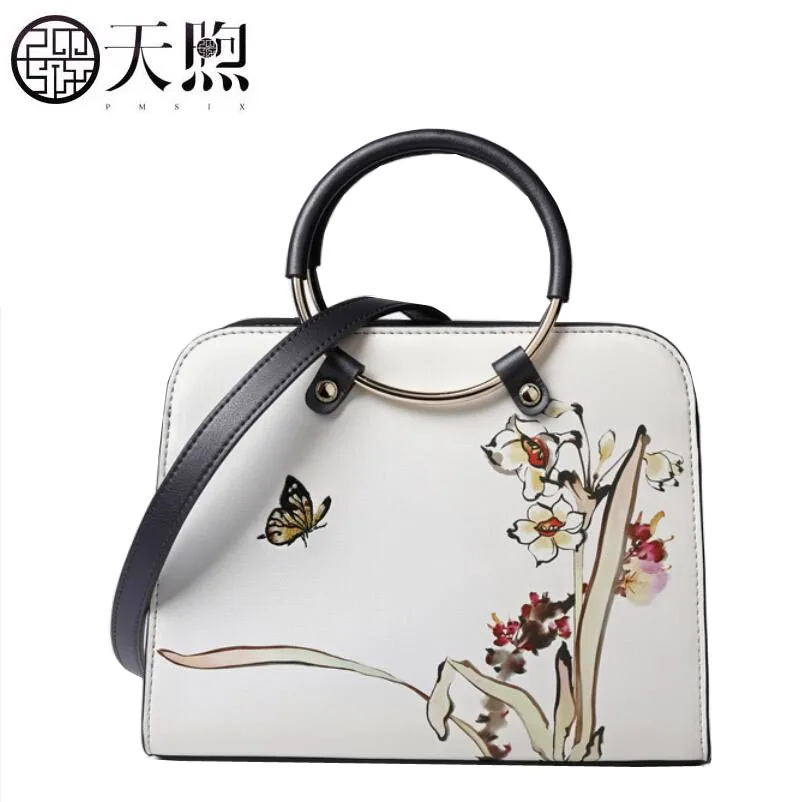 

2019 new high-end embroidery ring handbag National wind leather ladies shoulder Messenger bag