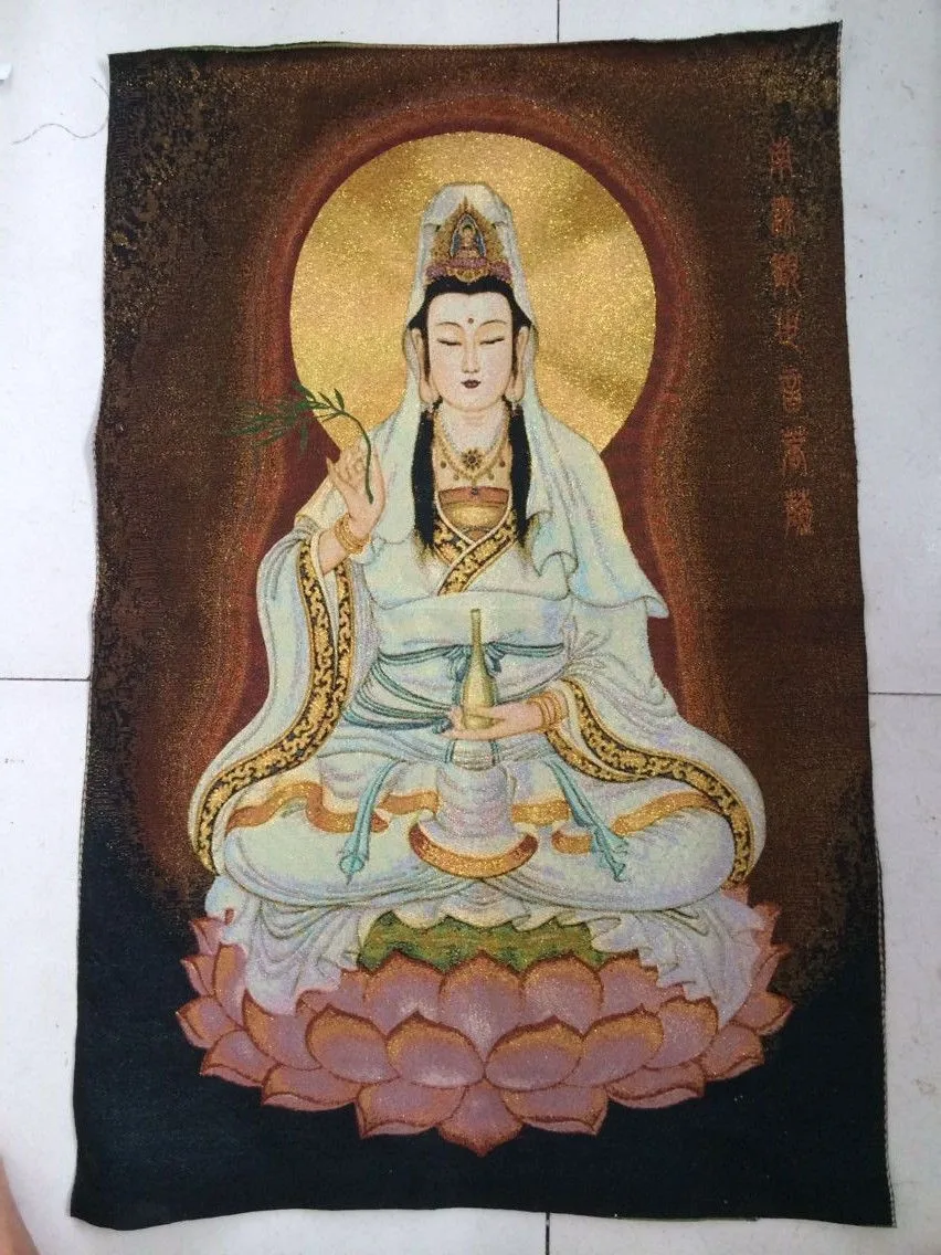 

The golden light, the goddess guanyin statue of Tibet and Nepal thangka