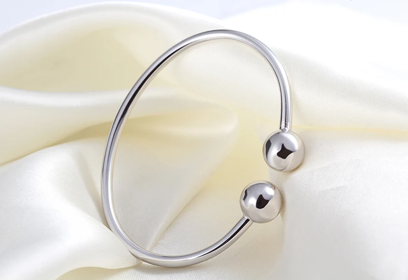 Adjustable sterling silver bangles (12)