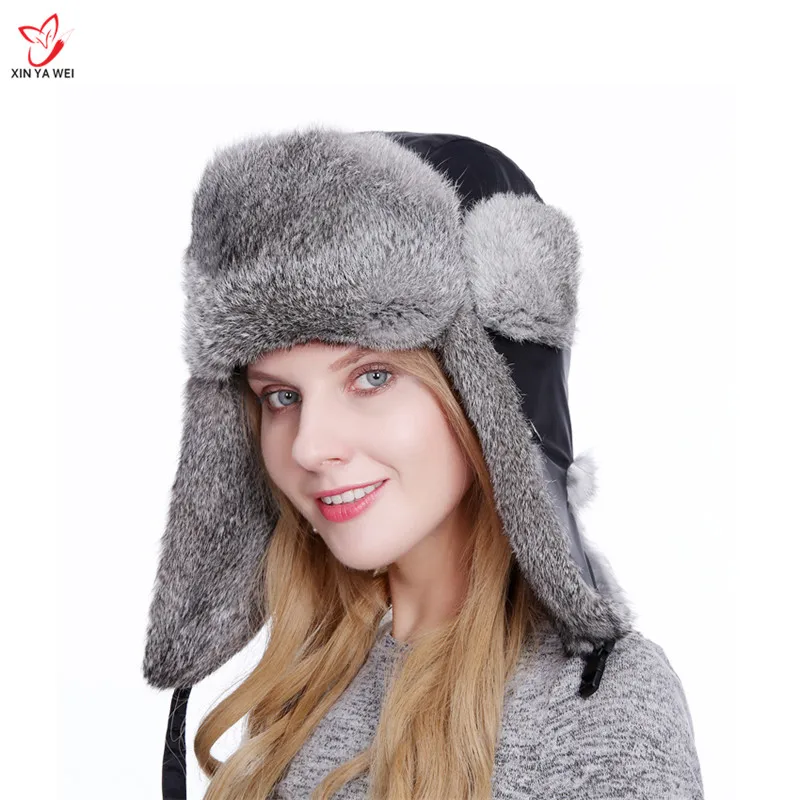 

Free Shipping Russian leather bomber leather hat women winter hats with earmuffs trapper earflap cap women real rabbit fur hats