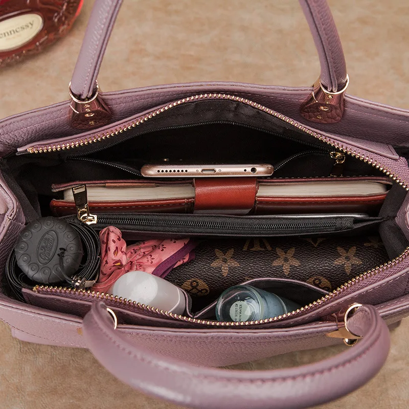 Beautiful romantic new lychee pattern women leather handbags fashion belt decoration fringed trend portable Messenger bag