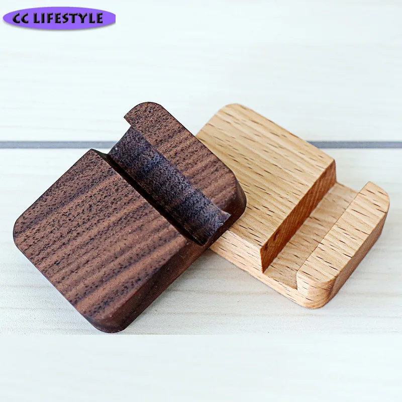 

Creative wooden mobile phone holder black walnut square small mobile phone seat lazy solid wood mobile phone care Tableware