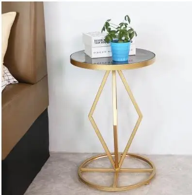 Nordic iron coffee table side golden living room round sofa shelf side table tempered glass coffee table bedside small cabinet. Nordic iron coffee table side golden living room round sofa shelf side table tempered glass coffee table bedside small cabinet.