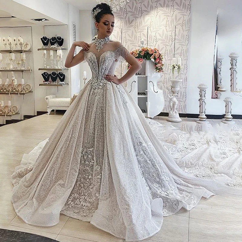 

Luxury Sequined Chapel Wedding Dresses Sheer Neck Beading Tassel Abric Dubai Wedding Gown Court Train Bridal Dress 2019