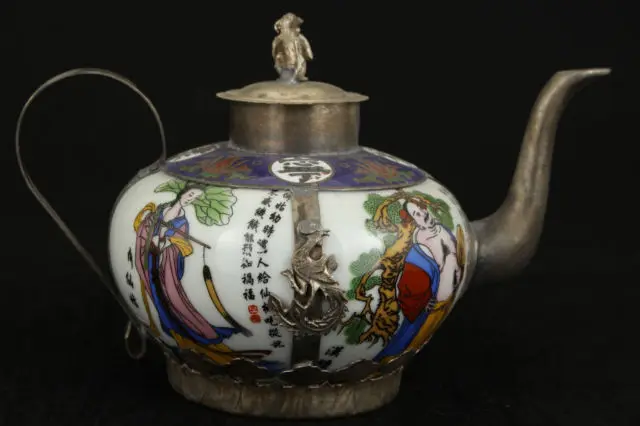 

Elaborate Chinese Old-style Handmade Porcelain Inlaid with Tibetan Silver Statue Teapot