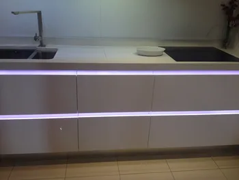 

Handle free kitchen cabinet with LED light