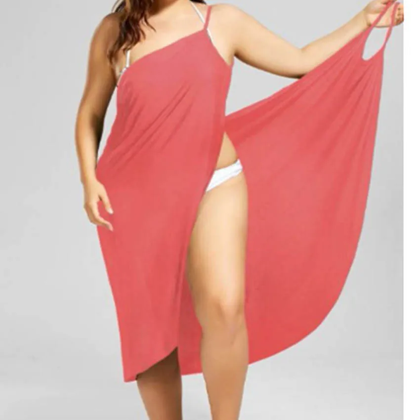 

New stitching solid color sexy beach strap dress