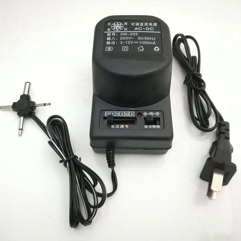 

AC 220V IN Adjustable output Power Adapter Out DC 3V 6V 9V 12V 1000MA 1A Transformer