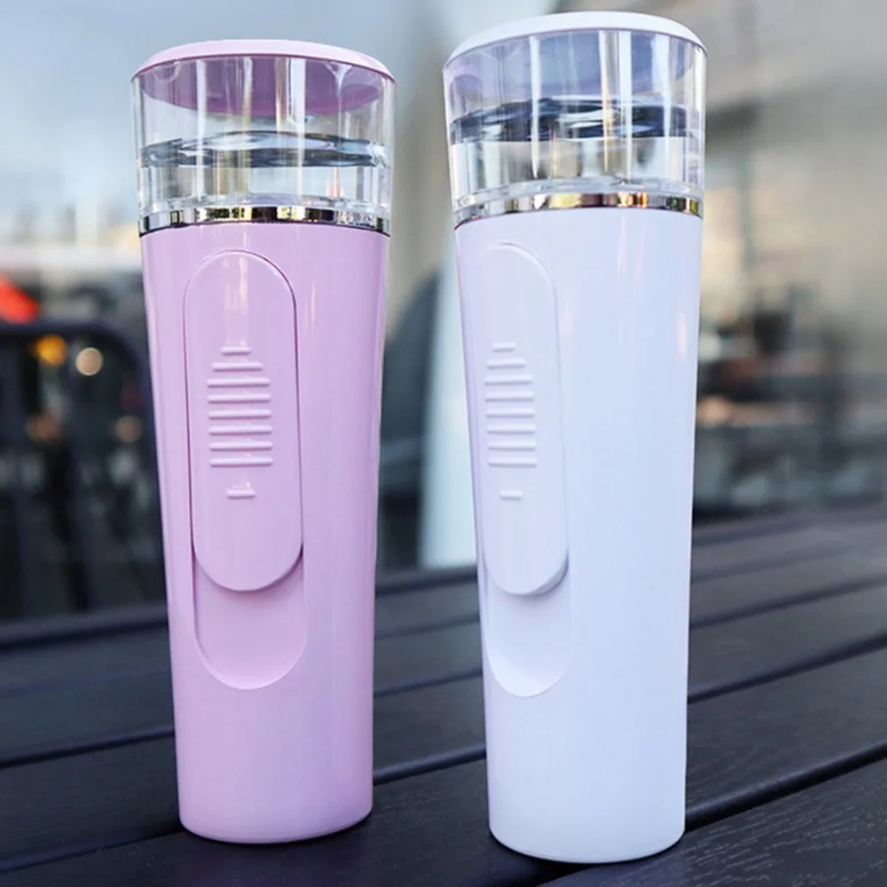 

Handheld nano cold spray beauty instrument negative ion steamer humidifier USB charging treasure two in one water meter