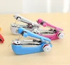 1pc Portable Mini Manual Sewing Machine Simple Operation Sewing Tools Sewing  Cloth Fabric Handy Needlework Tool LYQ 3