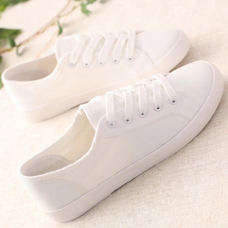 ladies white canvas plimsolls