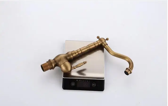 Full-copper retro washbasin faucet bathroom cabinet faucet cold and hot water faucet rotary table on basin faucet free shipping Full-copper retro washbasin faucet bathroom cabinet faucet cold and hot water faucet rotary table on basin faucet free shipping