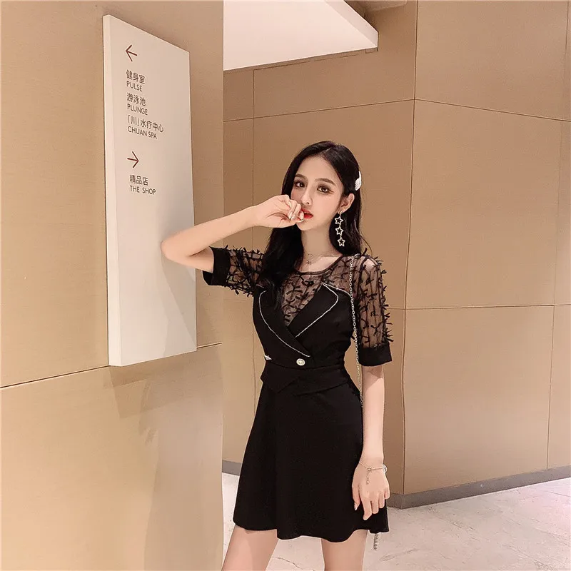 

2019 spring fashion new Korean version fashion hollow mesh tassel slimming slim circular collar plain dress